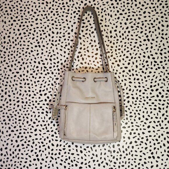 COLE HAAN Dove Grey Drawstring crossbody bag. - Picture 1 of 6